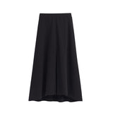 A-line skirt with an elastic waistband and asymmetrical hem.