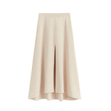 Long skirt with a high waist and front slit.