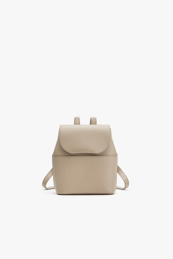 cuyana mini backpack Women's Linea Bucket Bag in Stone this bag has a leather lining and durable gold Mini Leather Backpack