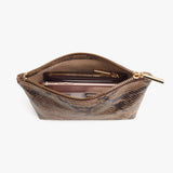Open cosmetic bag with a lipstick inside