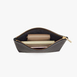 Open small pouch with a wallet and a lipstick inside.