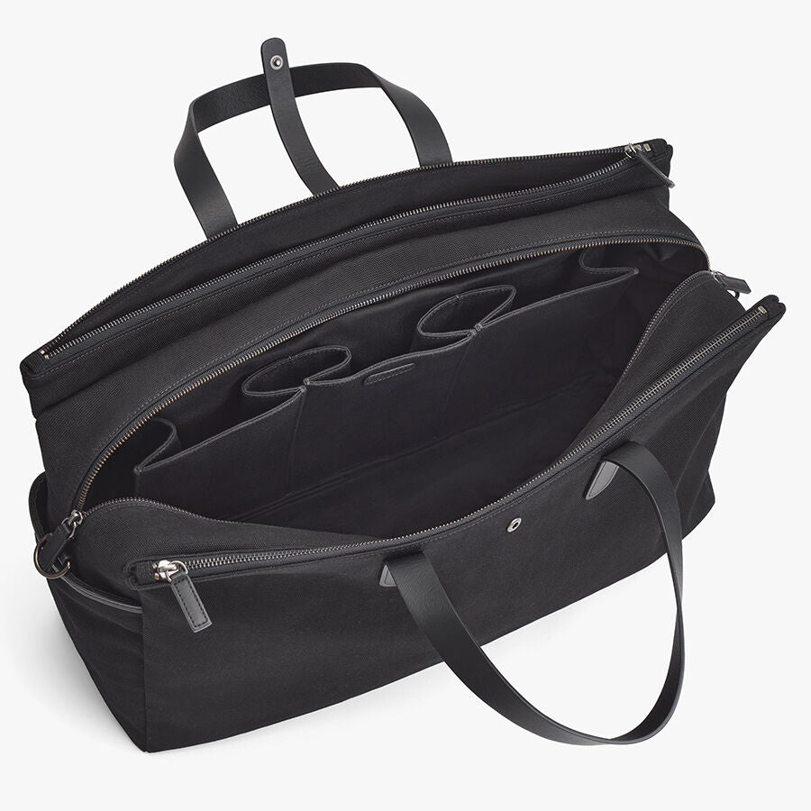 Open travel bag with compartments visible.