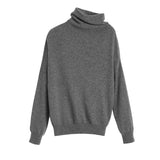 Turtleneck sweater on plain background