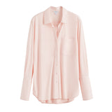 Button-up shirt with a collar and long sleeves, one pocket on the front.