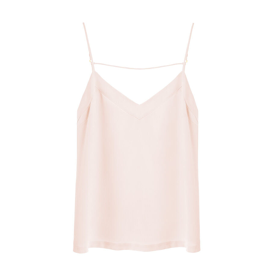 Sleeveless top with thin straps and a V-neckline.
