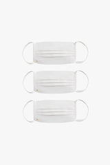 Three face masks arranged vertically on a plain background.