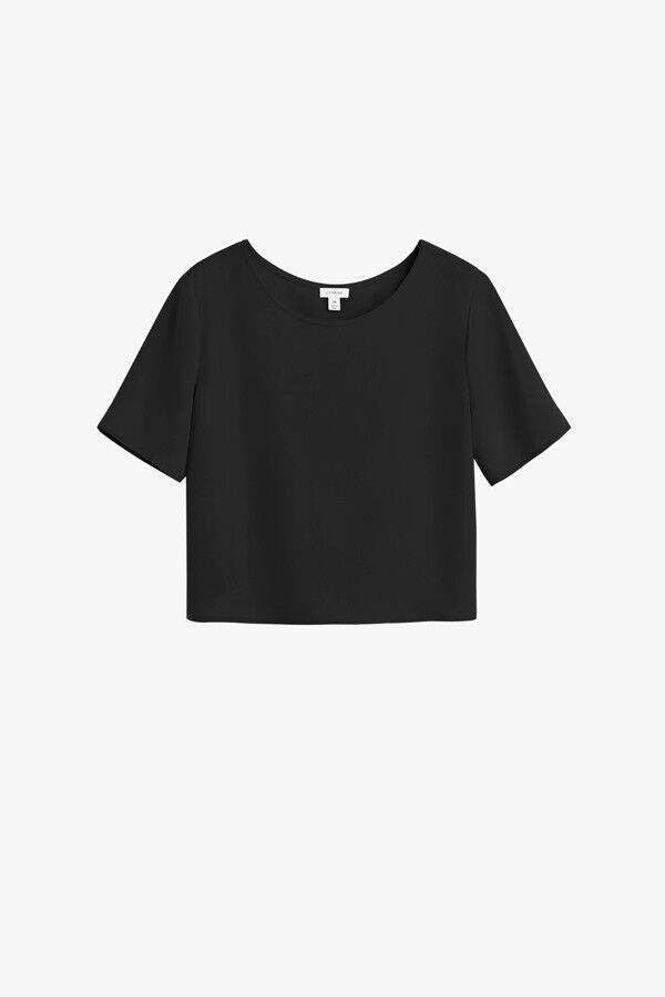 Short-sleeved top isolated on a plain background.
