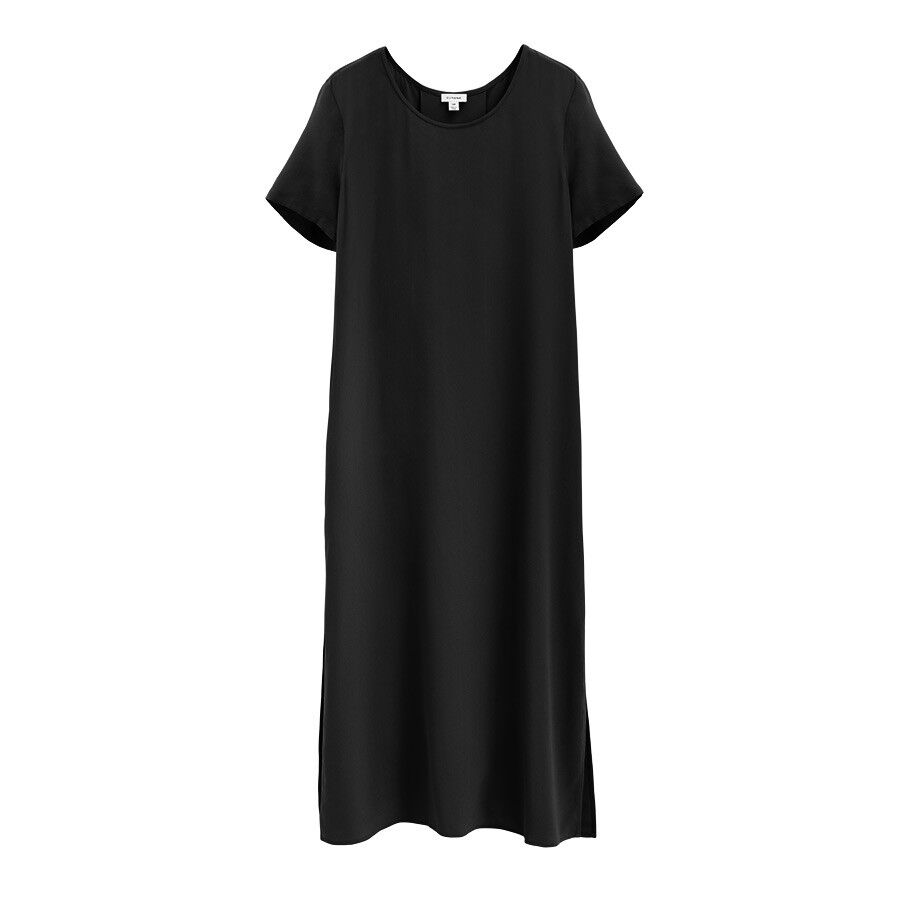 Short-sleeved dress hanging against a plain background.