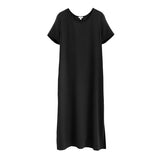 Short-sleeved dress hanging against a plain background.