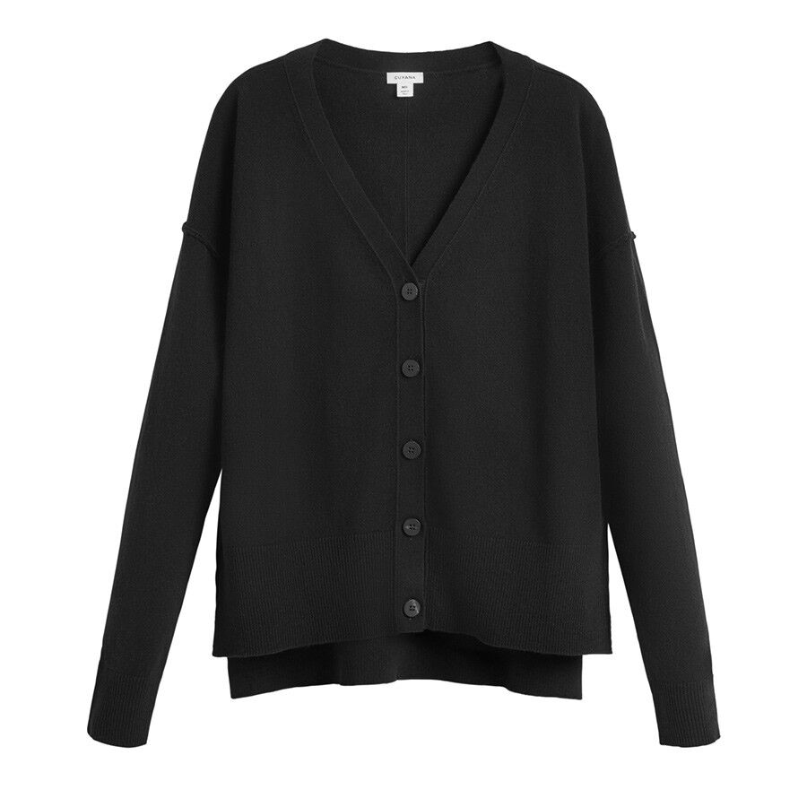 Button-up cardigan with long sleeves on a plain background.