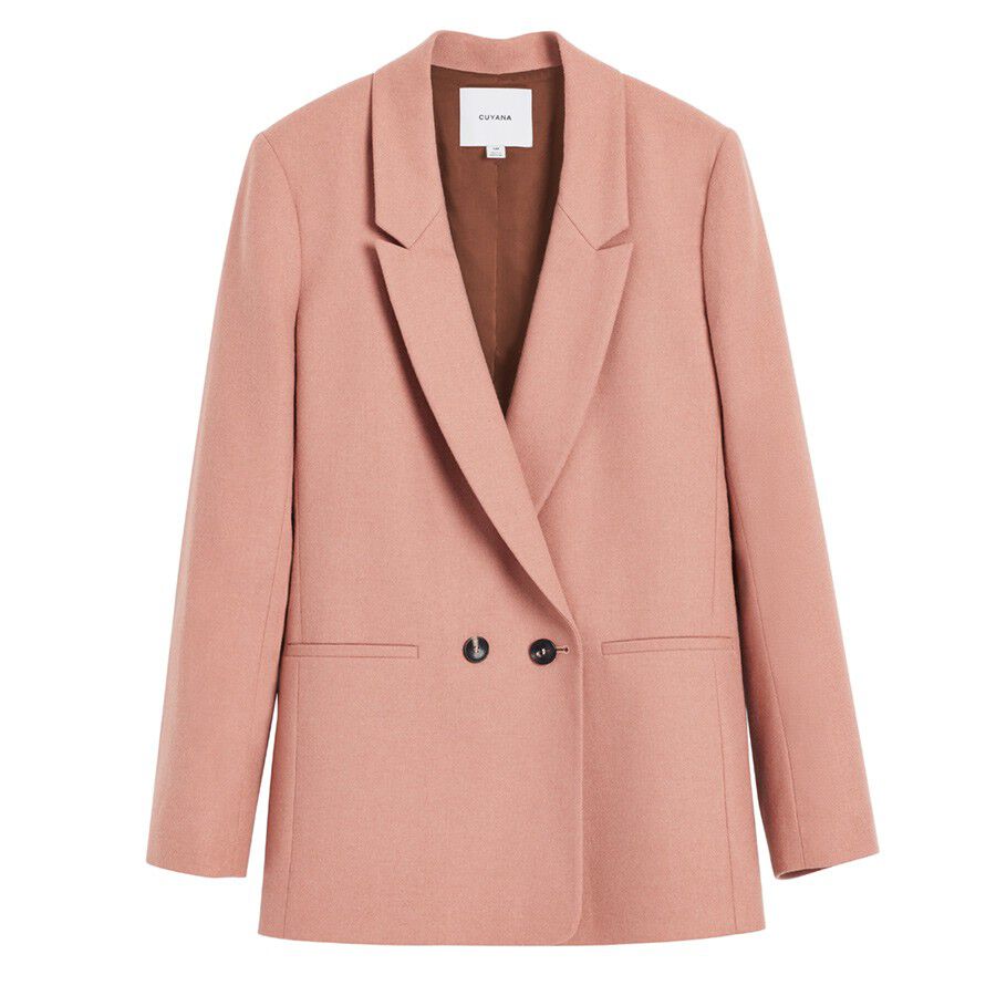 Double-breasted women's blazer with lapels and buttons.
