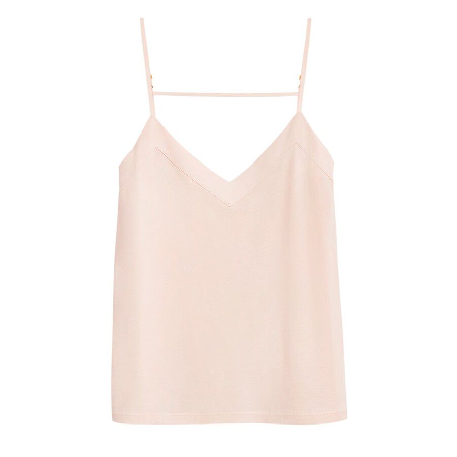 Sleeveless top with thin straps and a v-neckline.