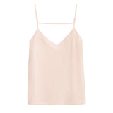 Sleeveless top with thin straps and a v-neckline.