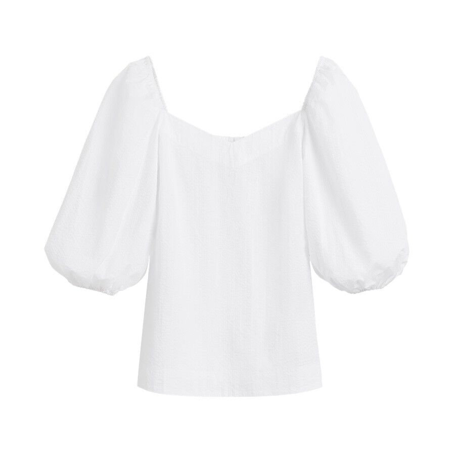 Women's blouse with puffy sleeves and off-shoulder neckline.
